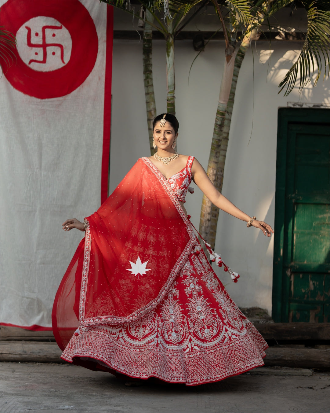 Regal Red Bridal Bandhani Lehenga with Intricate Embroidery