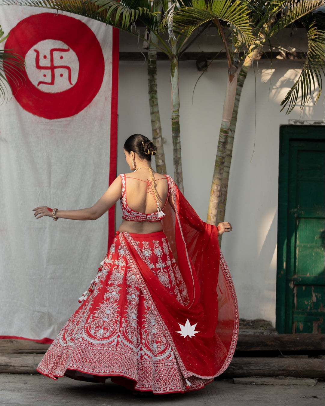 Regal Red Bridal Bandhani Lehenga with Intricate Embroidery