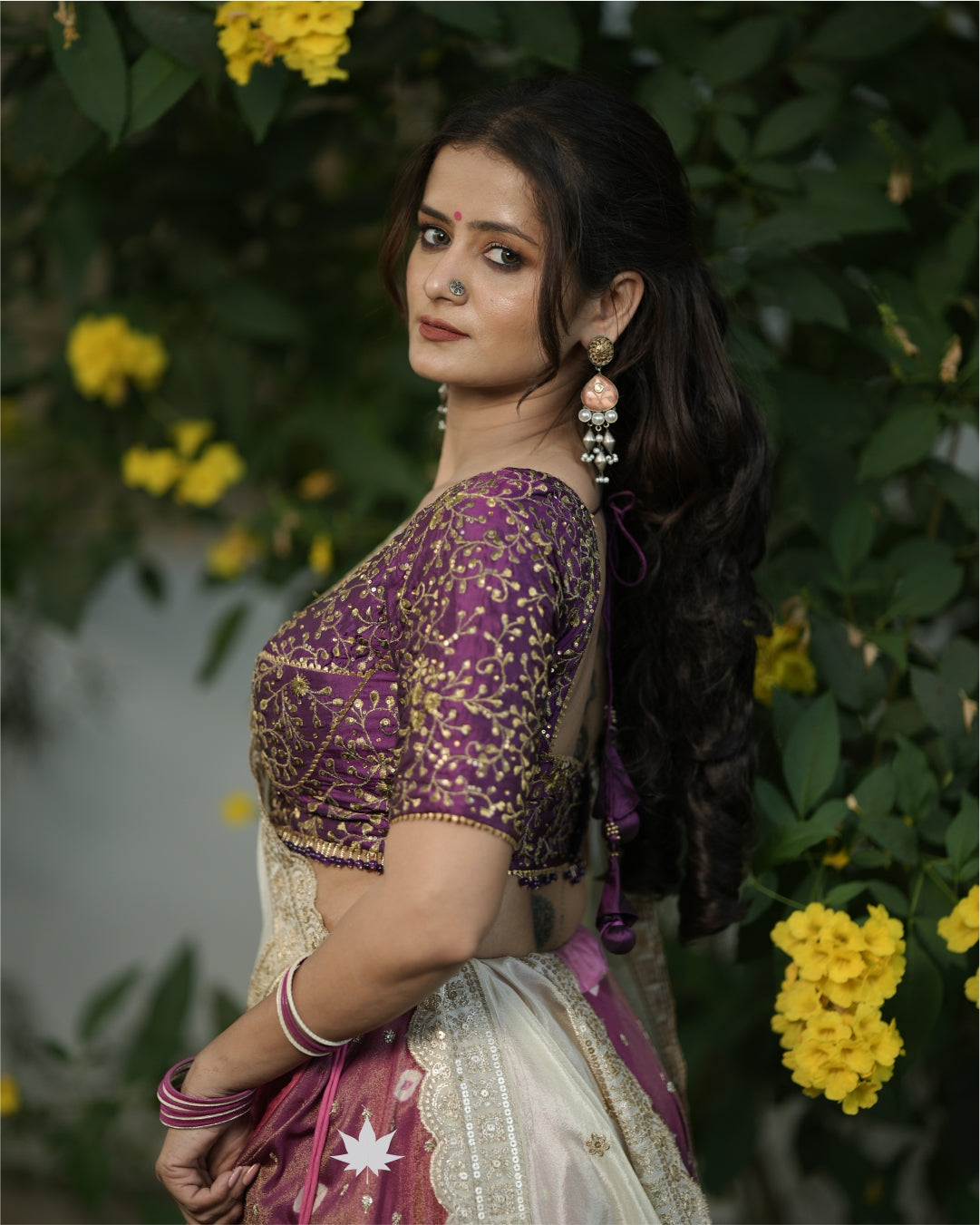 Multicolour Bandhani Chaniya With Purple Silk Blouse And Off White Dupatta Set