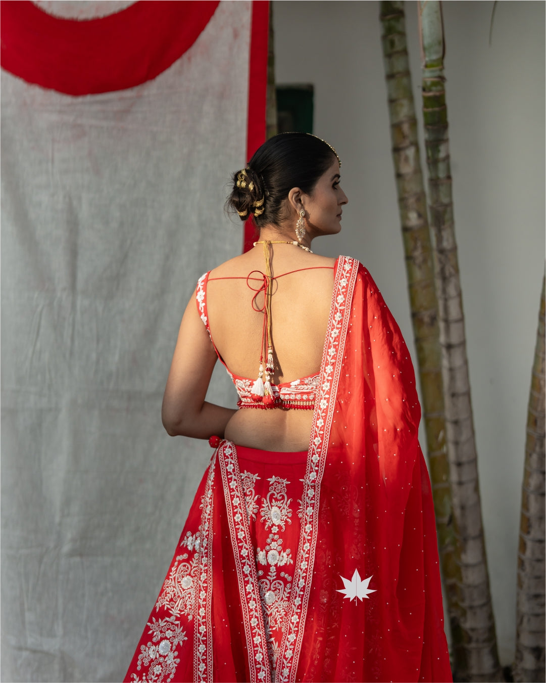 Regal Red Bridal Bandhani Lehenga with Intricate Embroidery