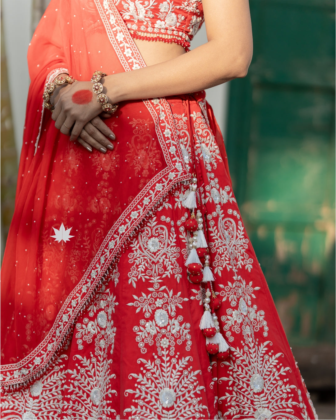 Regal Red Bridal Bandhani Lehenga with Intricate Embroidery