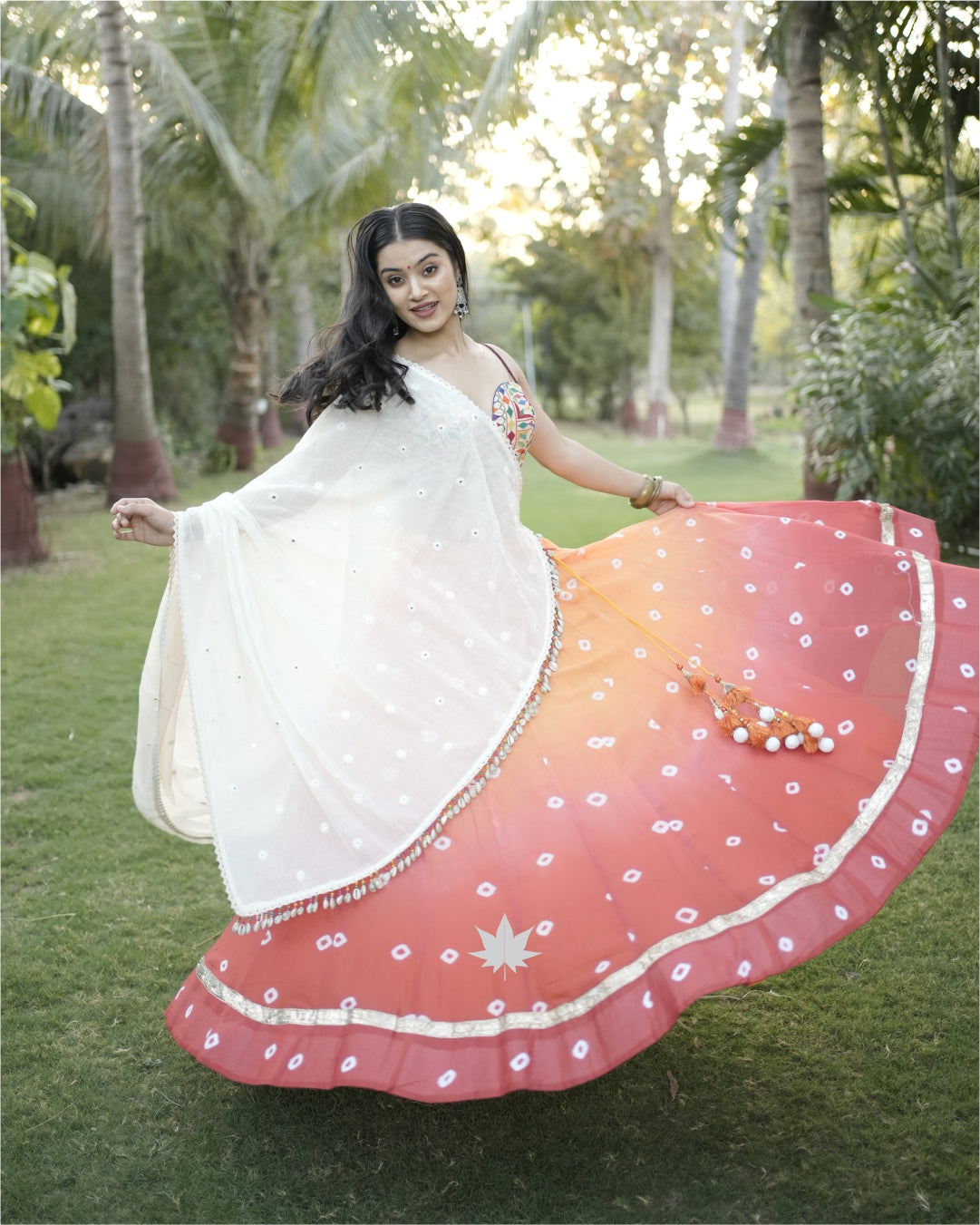 Orange Bandhani Chaniya With Gamthi Work Blouse And White Dupatta