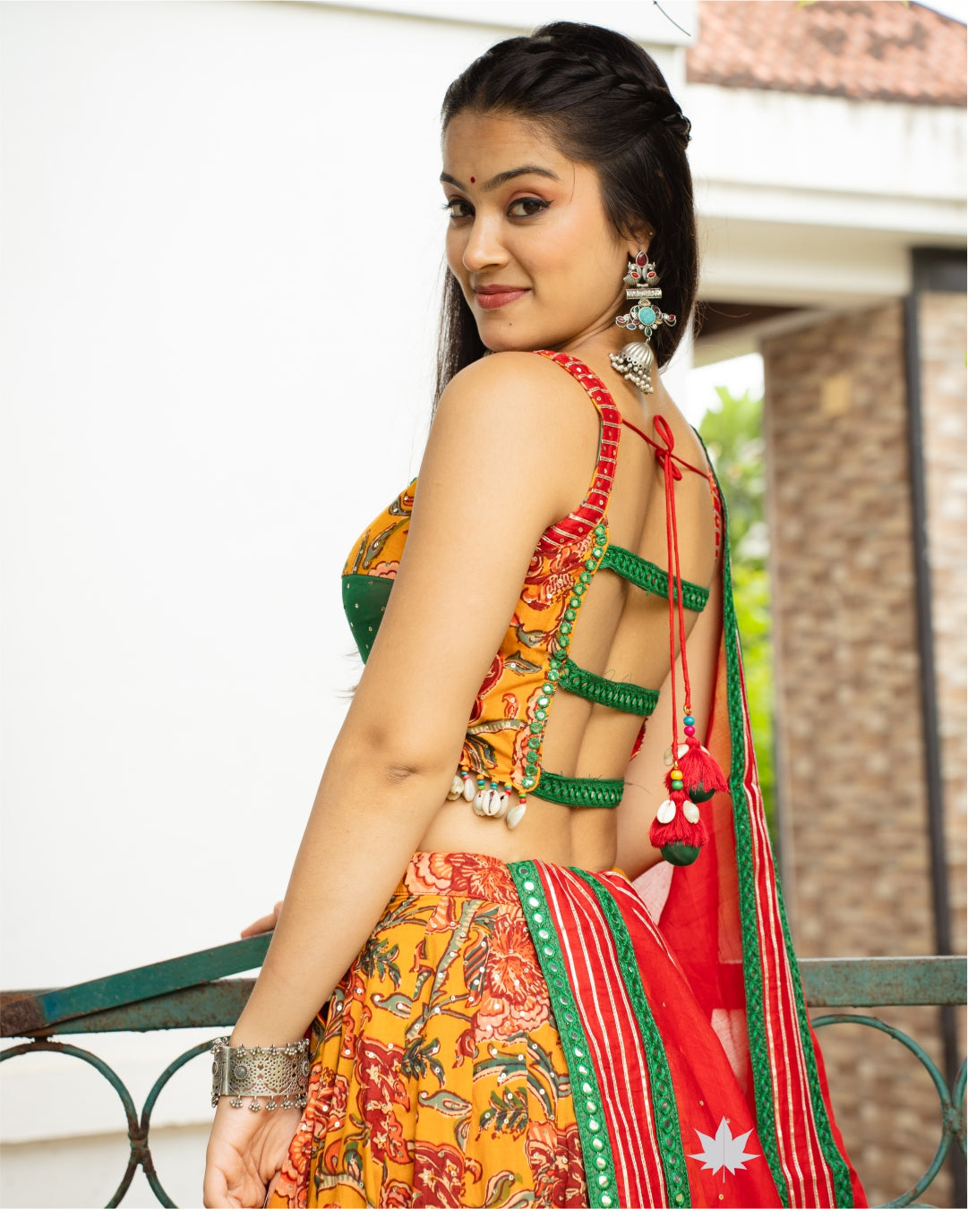 Fiery Yellow Floral Chaniya Choli Set with Bottle Green blouse