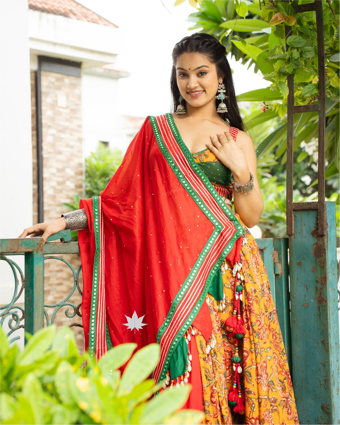 Fiery Yellow Floral Chaniya Choli Set with Bottle Green blouse