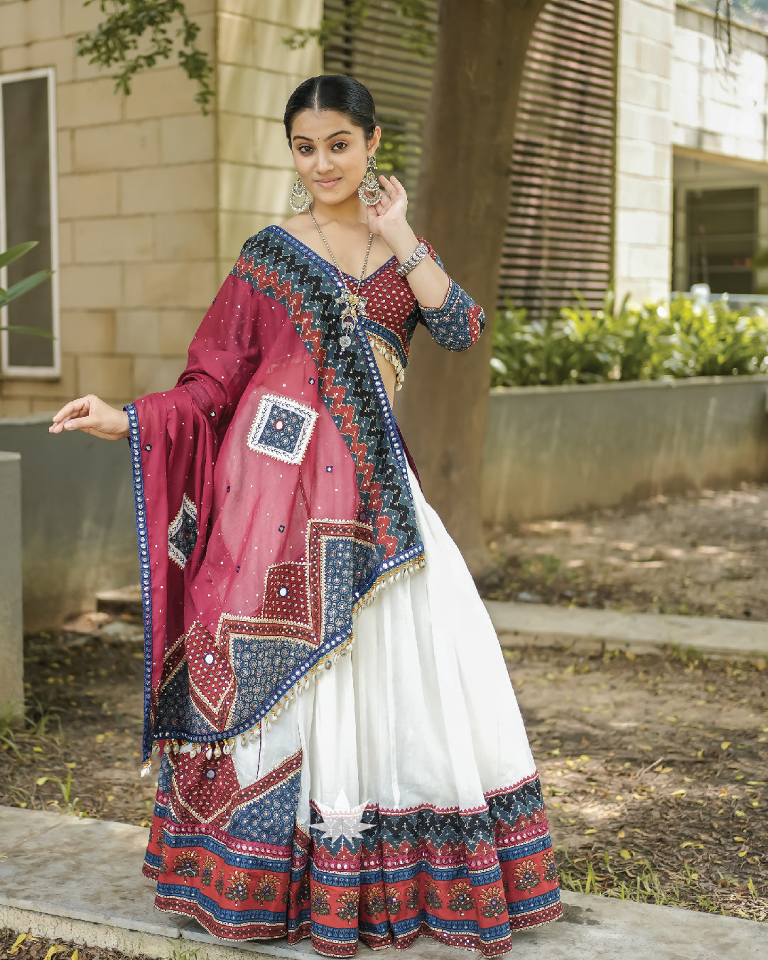 Off white chaniya choli with red and blue patchwork set