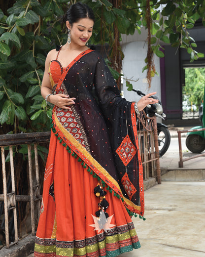 Orange Assyemetrical Chaniya With Orange Blouse And Patchwork Dupatta Set