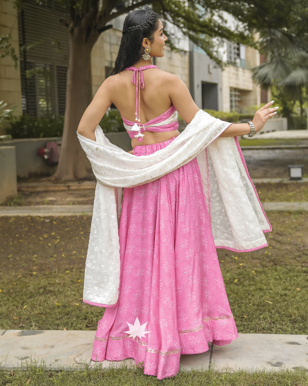 Pink bandhani with white blouse and dupatta set