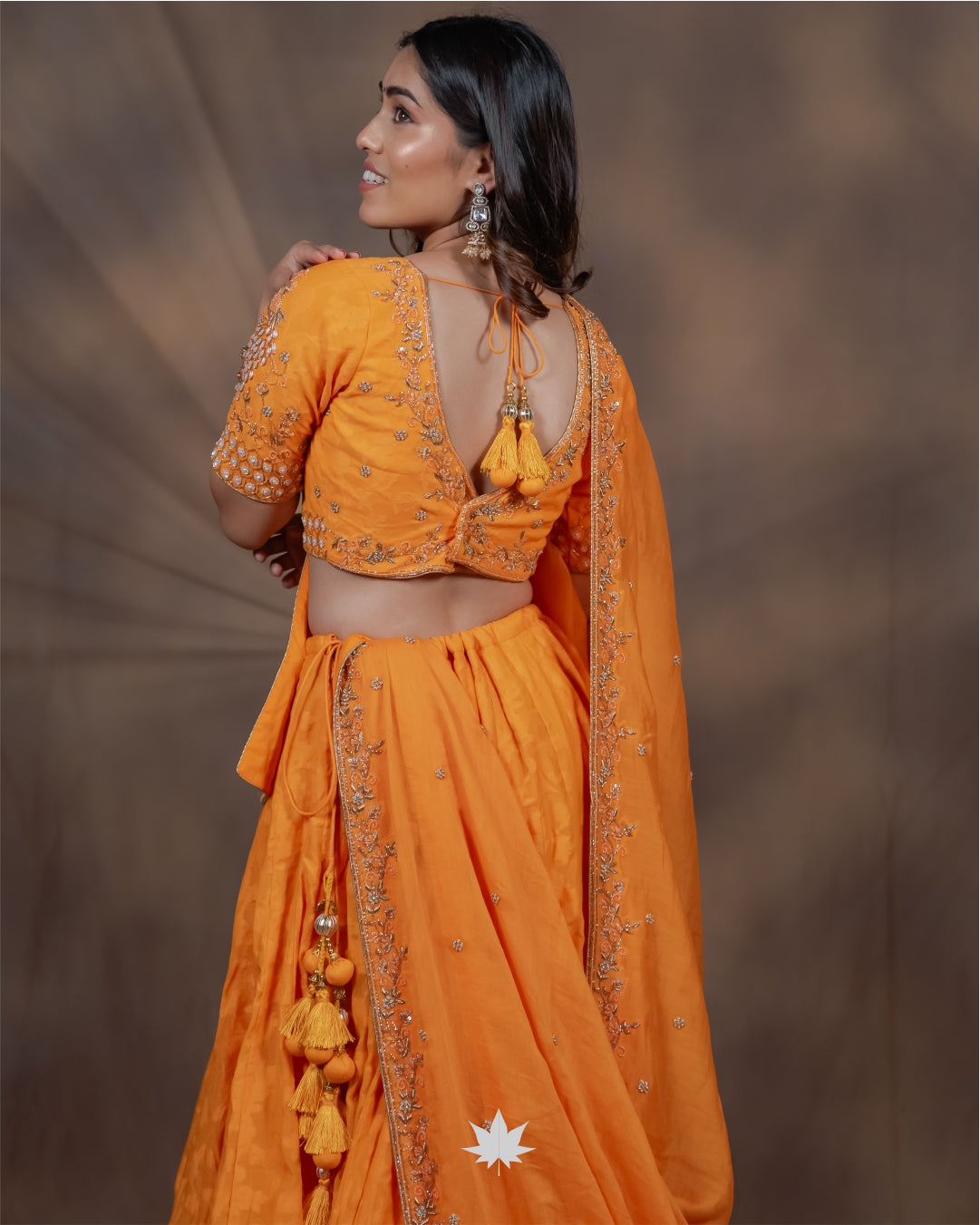 Yellow Bandhani Chaniya Choli with Mirror Work