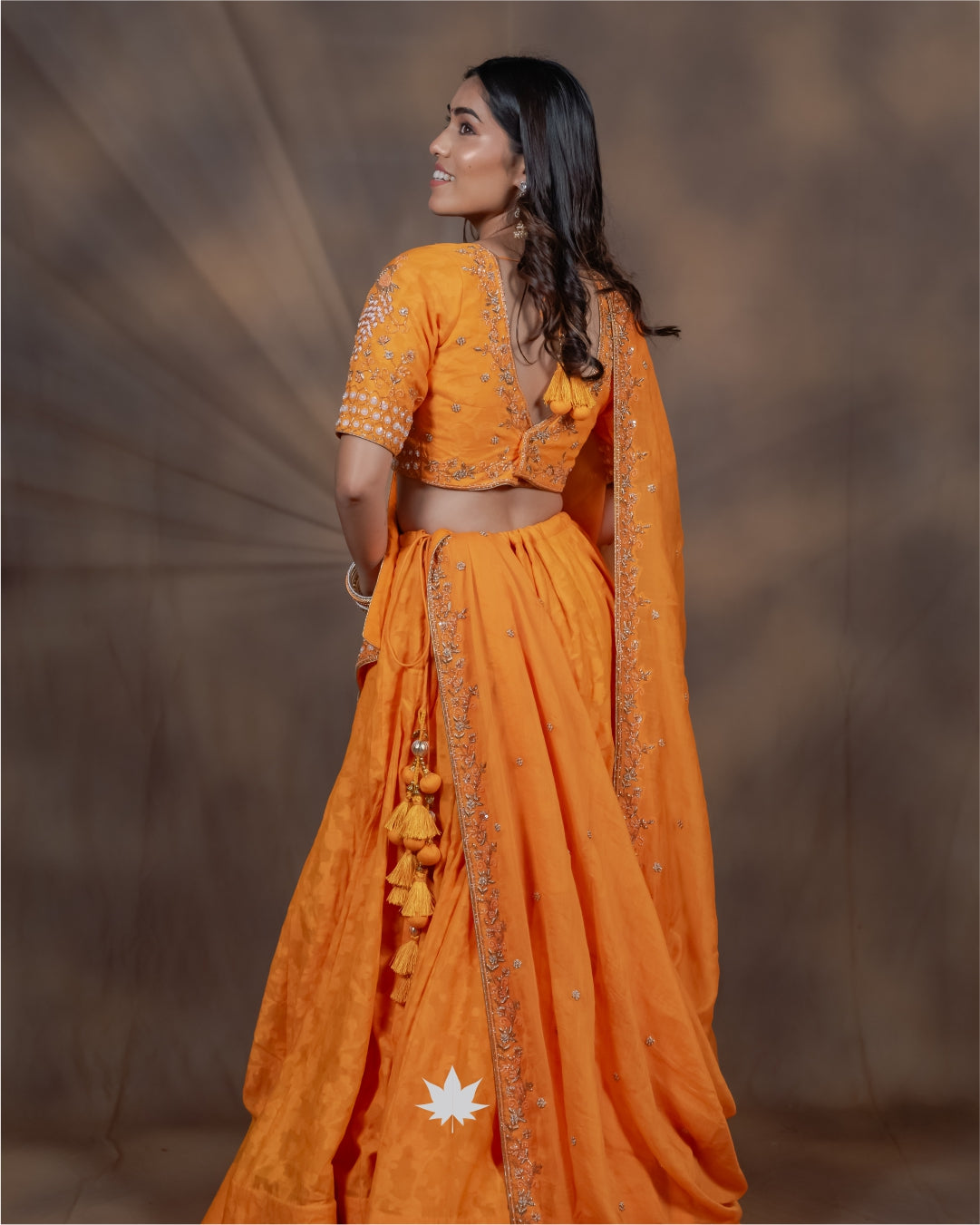 Yellow Bandhani Chaniya Choli with Mirror Work
