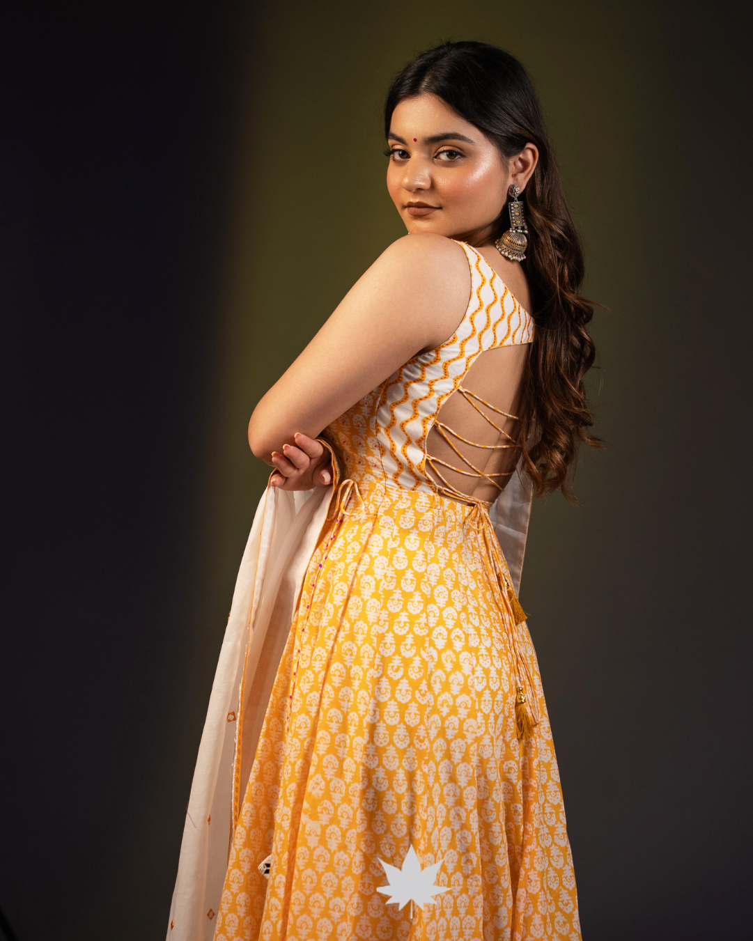 Mustard-Yellow floral Anarkali suit with ivory dupatta