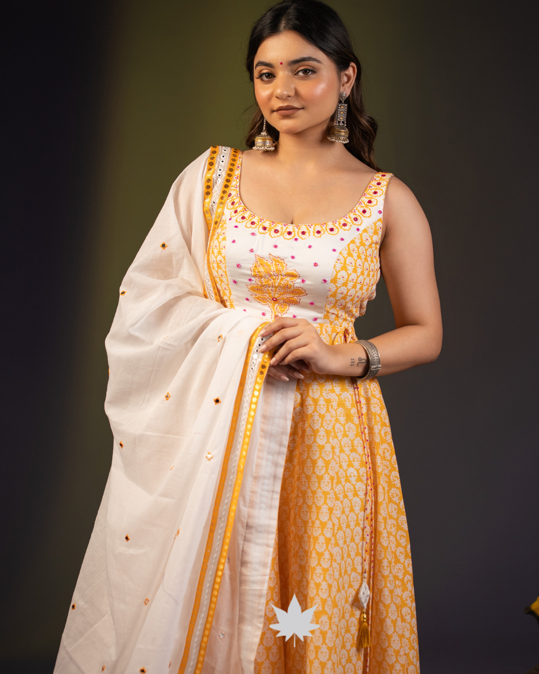 Mustard-Yellow floral Anarkali suit with ivory dupatta